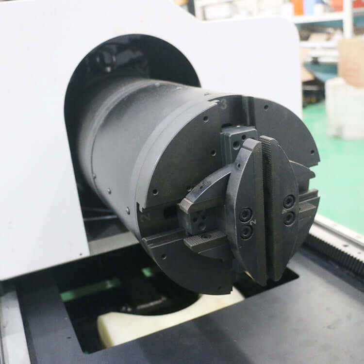Close-up of a high-precision fiber laser cutting machine designed for pipe cutting.