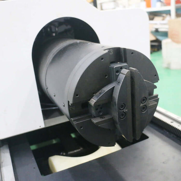 Close-up of a high-precision fiber laser cutting machine designed for pipe cutting.