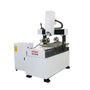 4 Axis Mini CNC Router for 2D & 3D engraving with rotary axis, used for metals like stainless steel and aluminum.