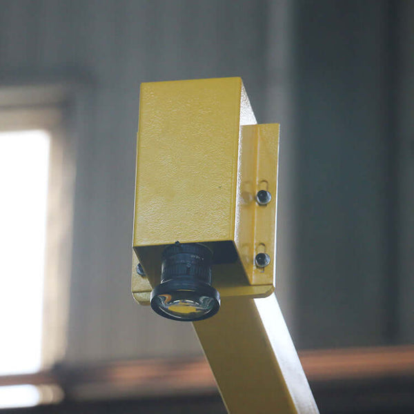 Close-up of a component from a 5-axis bridge saw machine for stone cutting.