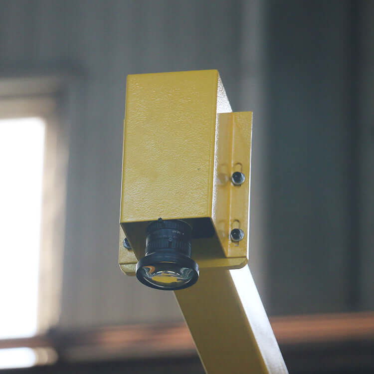 Close-up of a component from a 5-axis bridge saw machine for stone cutting.