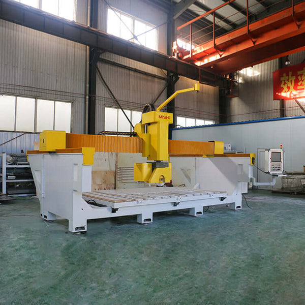 Precision 5-axis bridge saw CNC machine for cutting stone kitchen countertops, including quartz, marble, and granite slabs.