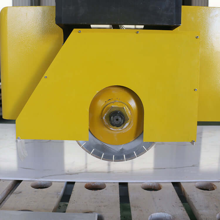 5-axis bridge saw machine for precision stone cutting, featuring a yellow saw blade, ideal for kitchen countertops like quartz and granite.
