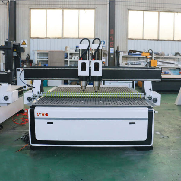 High-efficiency precision double head CNC router for wood engraving in a workshop setting, ideal for furniture manufacturing.