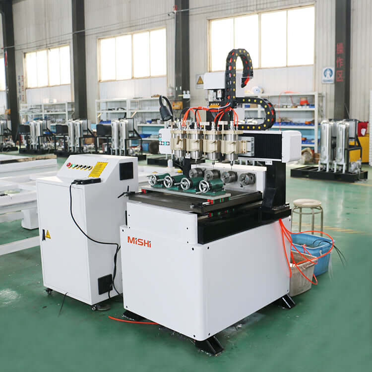 Precision 4-axis mini CNC router with rotary axis for 3D wood carving and metal engraving in a workshop setting.