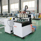 Precision 4-axis mini CNC router with rotary axis for 3D wood carving and metal engraving in a workshop setting.