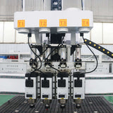 Multi-heads ATC CNC router machine with four spindles for woodworking, suited for furniture and cabinet manufacturing.