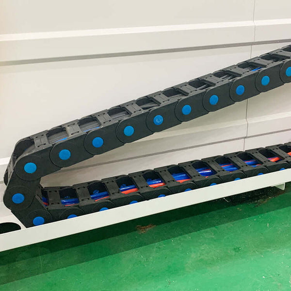 Detail view of heavy-duty stone CNC router cable chain for durable and precise stone processing.