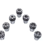 Set of precision tool collets arranged in a triangular formation on a white background