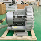 Industrial vacuum pump with corrosion-resistant bronze impeller, space-saving design, displayed on a wooden pallet.