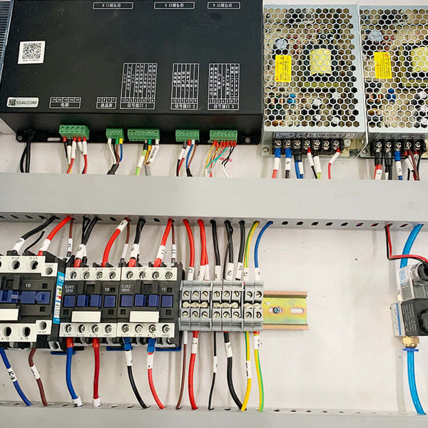 Internal components of a 3-in-1 laser machine for metal processing, showing circuit and wiring setup