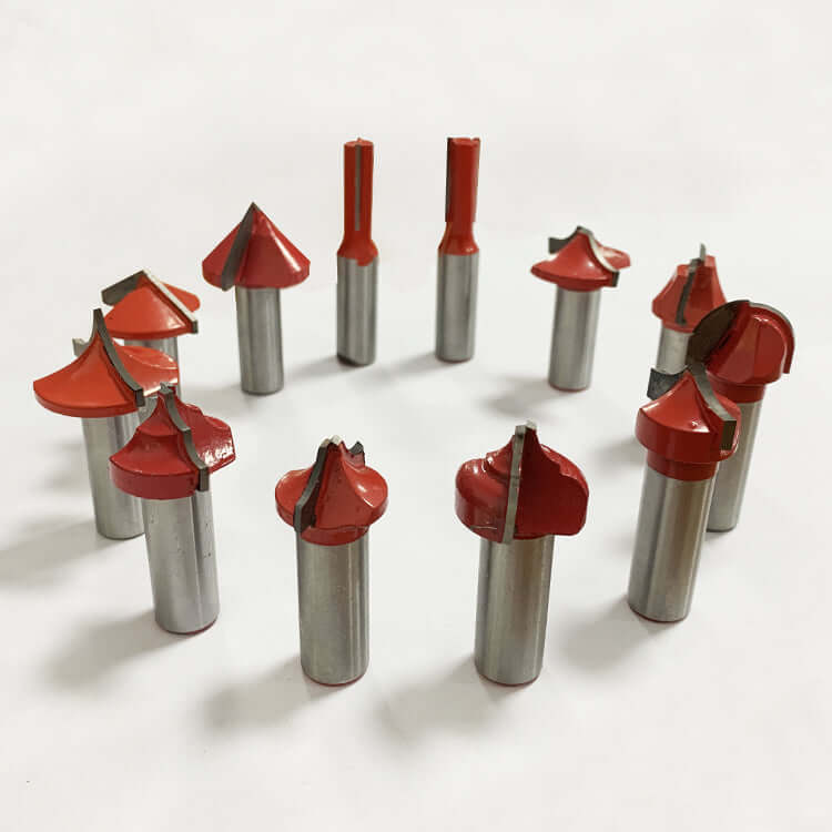 Set of premium red woodworking router bits for precision cutting on a white background.