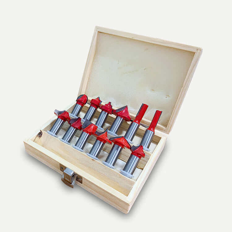 Set of red-tipped mill tools in a wooden case for precise cutting and shaping, ideal for woodworking and metalworking projects.