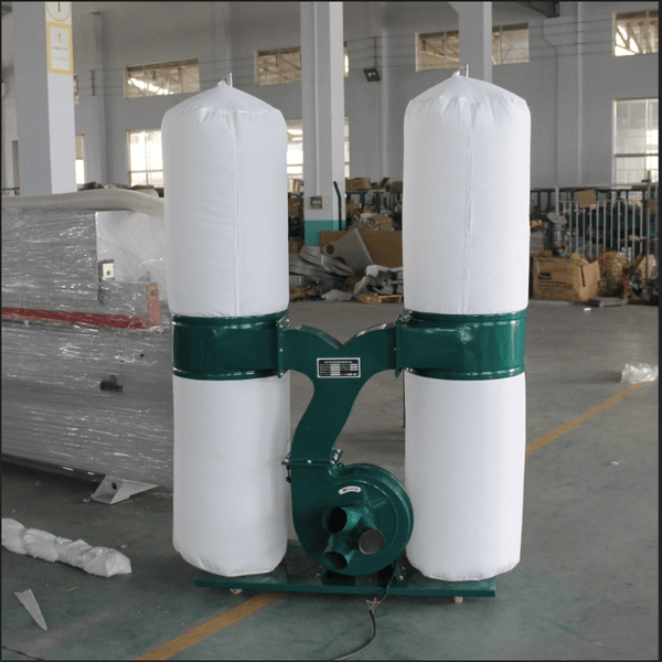 Portable industrial dust collector with dual filters in a workshop setting